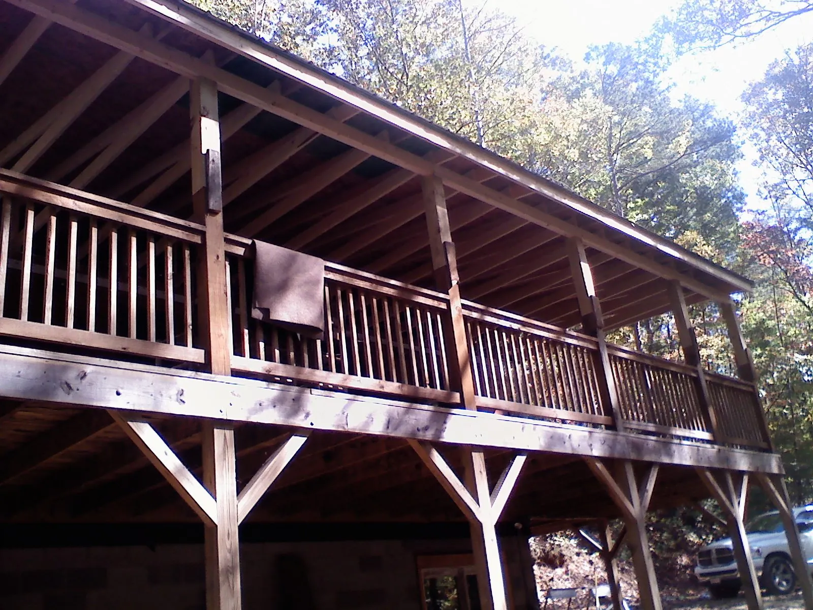 Timber framing under a new elevated porch and deck — Roof Leak Repair in North Babylon by Roofing Brothers